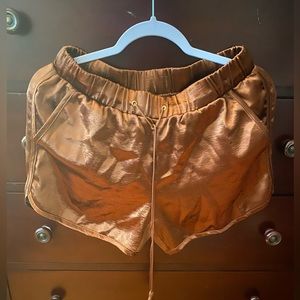 New York and Company. Very beautiful metallic copper color shorts.